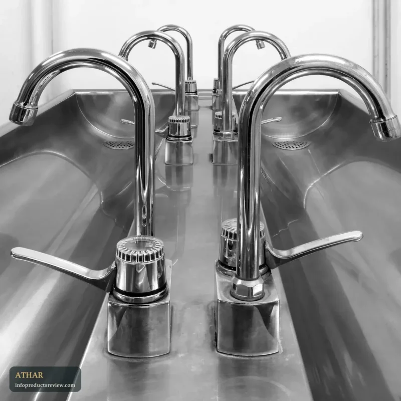 Polished taps over a steel washbasin